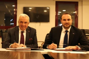 Bursa Nilüfer'de yeni kapalı hentbol salonu için arsa tahsis protokolü imza töreni.