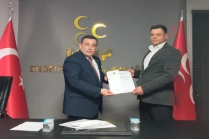 MHP Bilecik Pazaryeri İlçe Başkanı Onur Yalamaç'ın yeniden göreve getirilmesini gösteren görsel.