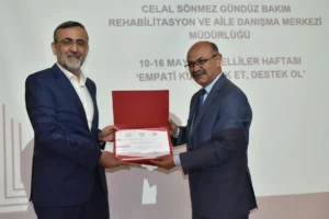 Bursa'da toplu ulaşım erişilebilirliği belgesi alan BURULAŞ yöneticileri