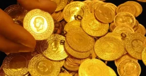 Altın fiyatları grafiği ve yükselen dolar sembolü